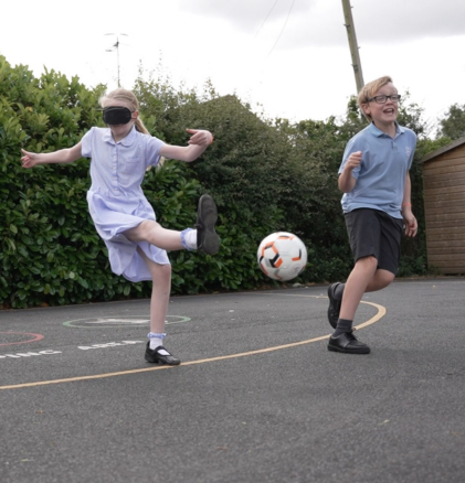 Children participating in accessibility awareness activity